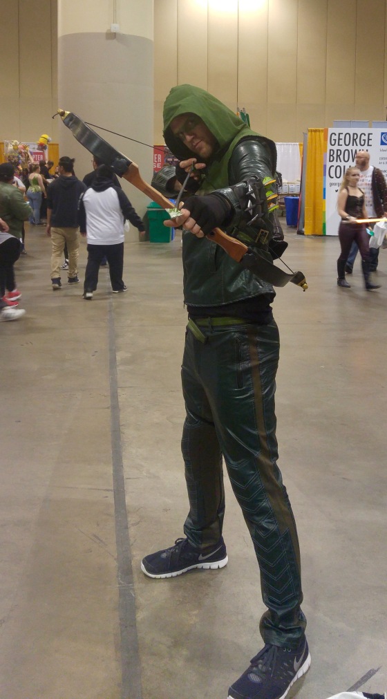 A cosplayer dressed up as Green Arrow from DC Comics.