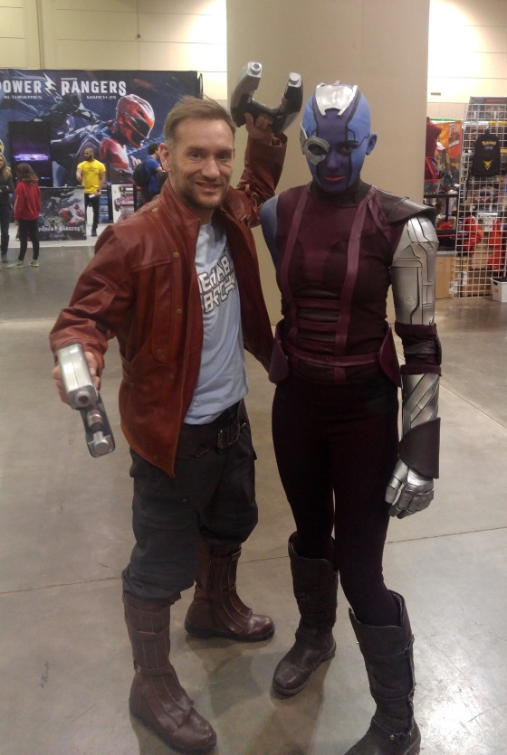 Two cosplayers, one as Star Lord and the other as Nebula.